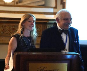Angela Betteridge presents Adom Knadjian with the Erol Paylan Lifetime Achievement Award